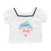 Fehér színű, rátéttel ellátott gyerekpóló lányoknak