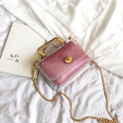 Μοντέρνα γυναικεία τσάντα με διαφανές κάλυμμα σε τέσσερα χρώματα με μεταλλική στερέωση