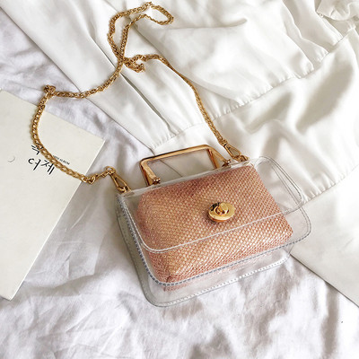 Μοντέρνα γυναικεία τσάντα με διαφανές κάλυμμα σε τέσσερα χρώματα με μεταλλική στερέωση