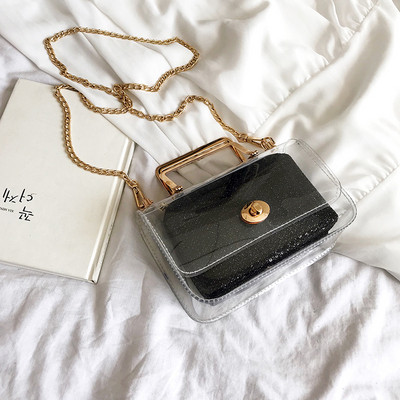 Μοντέρνα γυναικεία τσάντα με διαφανές κάλυμμα σε τέσσερα χρώματα με μεταλλική στερέωση