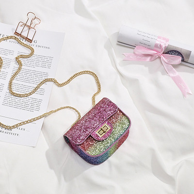 Μοντέρνα γυναικεία τσάντα με λαμπερά στοιχεία και μεταλλική αλυσίδα