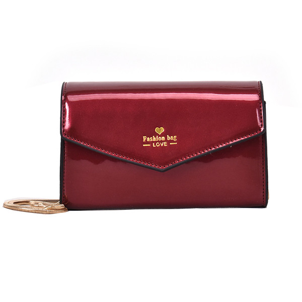 Μοντέρνα γυναικεία  τσάντα σε πέντε χρώματα και μεγάλη λαβή από μέταλλο