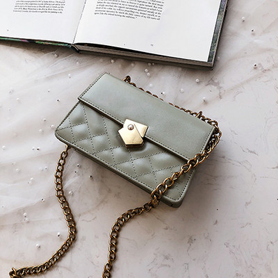 Öko bőrből készült modern női táska négy színben fém lánccal és fém csattal