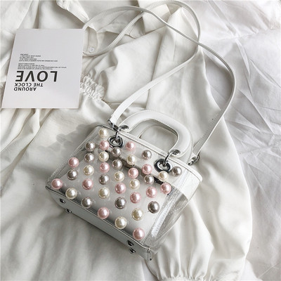 Modern női táska gyöngyökkel és átlátszó huzattal három színben, rövid és hosszú fogantyúval