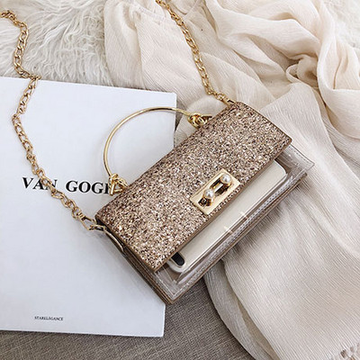 Κομψή γυναικεία τσάντα με λαμπερά στοιχεία και διαφανή  κάλλυμα με μεγάλη μεταλλική αλυσίδα