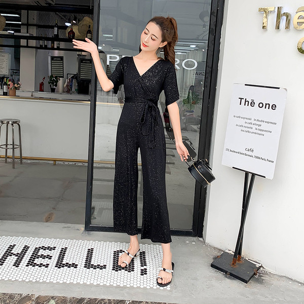 Stílusos női overall, fényes hatású fekete és sárga színben