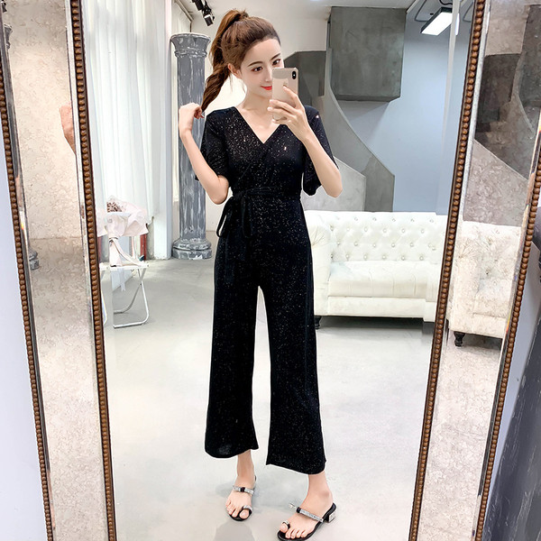 Stílusos női overall, fényes hatású fekete és sárga színben