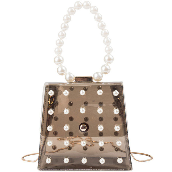 Geanta de dama transparenta cu maner scurt sidefat si lant lung metalic alb-negru