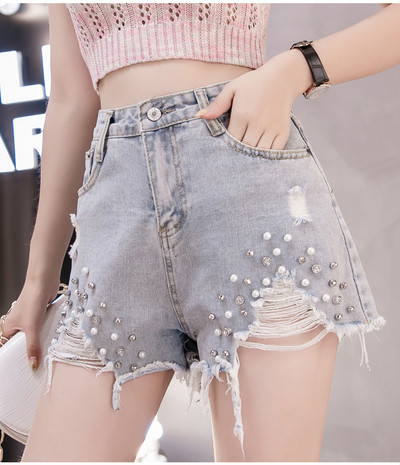 Farmer rövidnadrág szakadt motívumokkal és gyöngyökkel