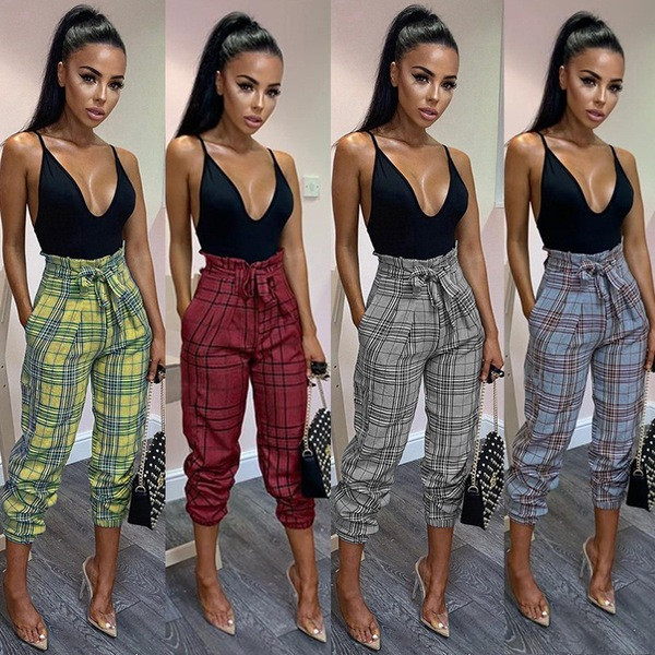 Modern női nadrág magas derékkal és nyakkendővel