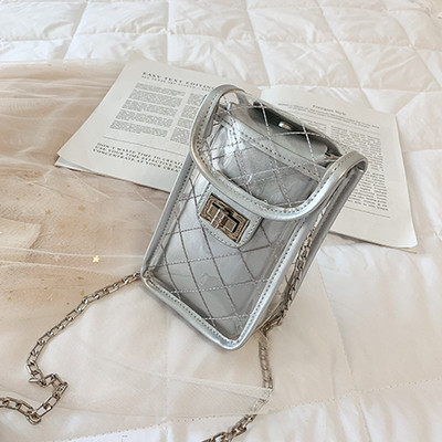 Korszerű női táska átlátszó huzattal öt színben, hosszú fémlánccal