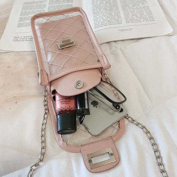 Korszerű női táska átlátszó huzattal öt színben, hosszú fémlánccal