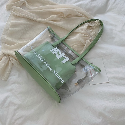 Μοντέρνη γυναικεία τσάντα με διαφανές κάλυμμα σε δύο χρώματα με μεγάλη λαβή