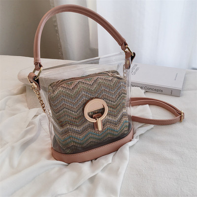 Modern női táska átlátszó huzattal öt színben, fém elemekkel és hosszú fémlánccal