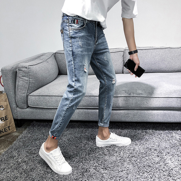 Lezser férfi farmer, szakadt motívummal