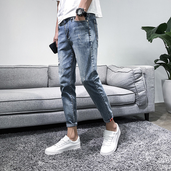 Lezser férfi farmer, szakadt motívummal