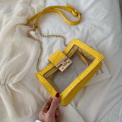 Modern átlátszó táska fém rögzítéssel és hosszú fém fogantyúval