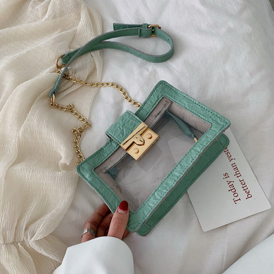 Modern átlátszó táska fém rögzítéssel és hosszú fém fogantyúval