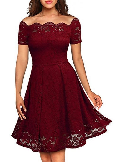 Elegant women`s dress cut-out model with lace and short sleeves