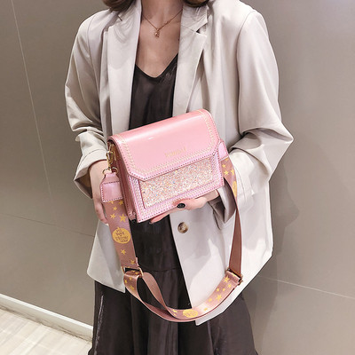 Eko bőrből készült stílusos női táska négy színben, fényes elemekkel és hosszú fogantyúval