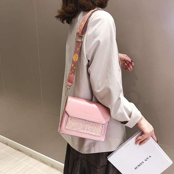 Eko bőrből készült stílusos női táska négy színben, fényes elemekkel és hosszú fogantyúval