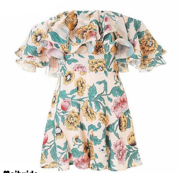 Női nyári overall rövid modell virágos motívummal