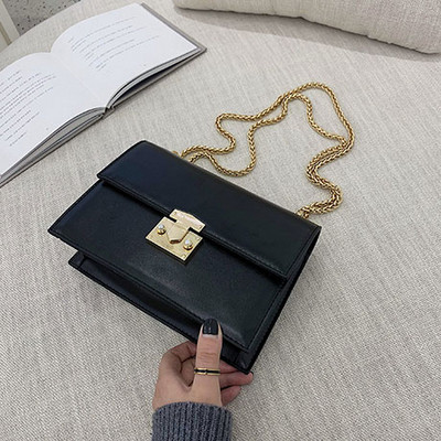 Öko bőrből készült modern női táska négy színben fém csattal és hosszú fém lánccal