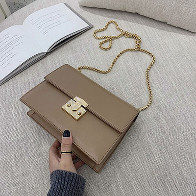 Öko bőrből készült modern női táska négy színben fém csattal és hosszú fém lánccal