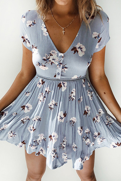 Modern női ruha rövid ujjú virágos motívumokkal