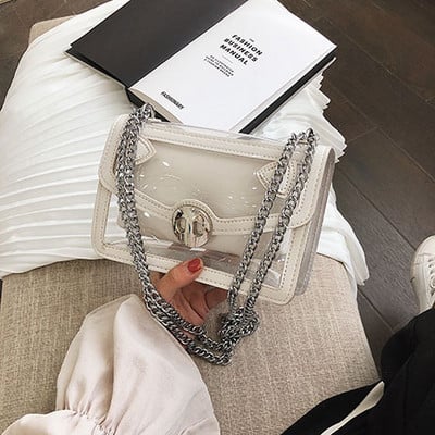 Μοντέρνα γυναικεία τσάντα με τρισδιάστατα στοιχεία σε τρία χρώματα και μεγάλη μεταλλική αλυσίδα