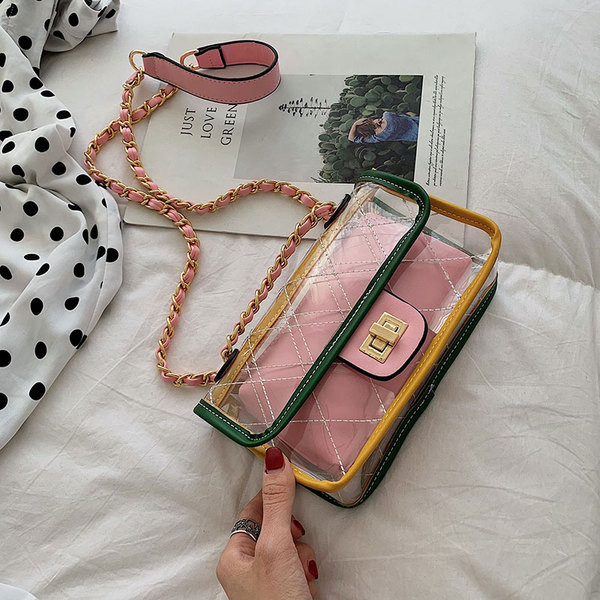 Geantă de damă modernă în patru culori cu husă transparentă și lanț metalic lung