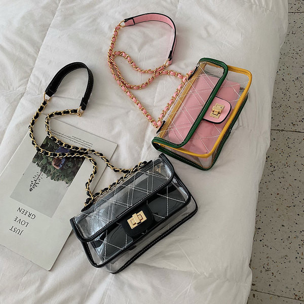 Geantă de damă modernă în patru culori cu husă transparentă și lanț metalic lung
