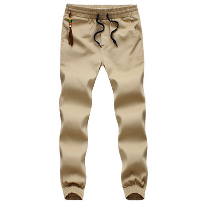 Sport és alkalmi férfi nadrág négy színben, bojttal