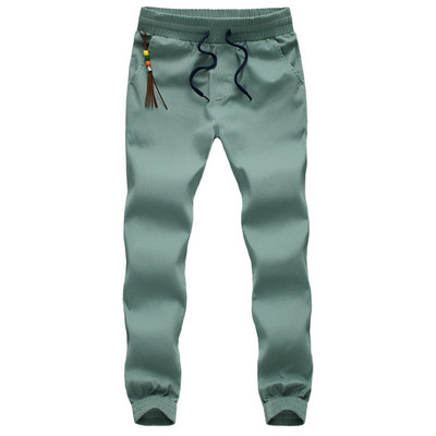 Sport és alkalmi férfi nadrág négy színben, bojttal