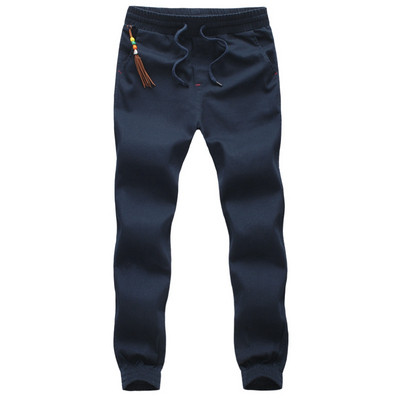 Sport és alkalmi férfi nadrág négy színben, bojttal