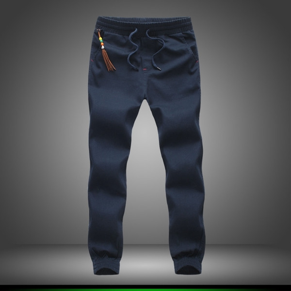 Sport és alkalmi férfi nadrág négy színben, bojttal