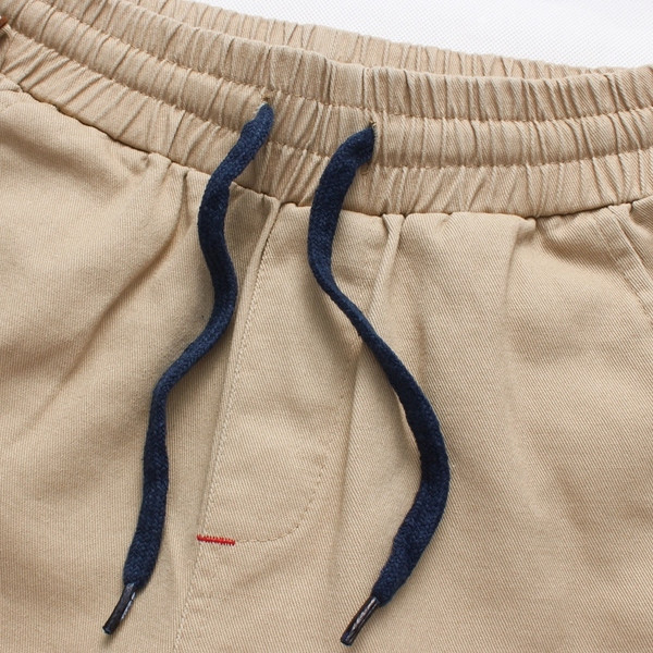 Sport és alkalmi férfi nadrág négy színben, bojttal