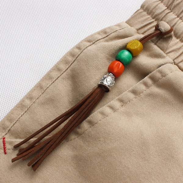 Sport és alkalmi férfi nadrág négy színben, bojttal