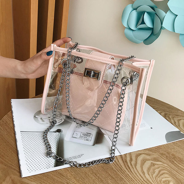 Geanta de dama moderna cu husa transparenta in patru culori cu inchizatoare metalica si lant metalic lung
