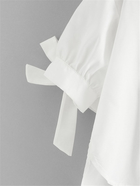 Cămașă de damă modernă model asimetric cu aplicație