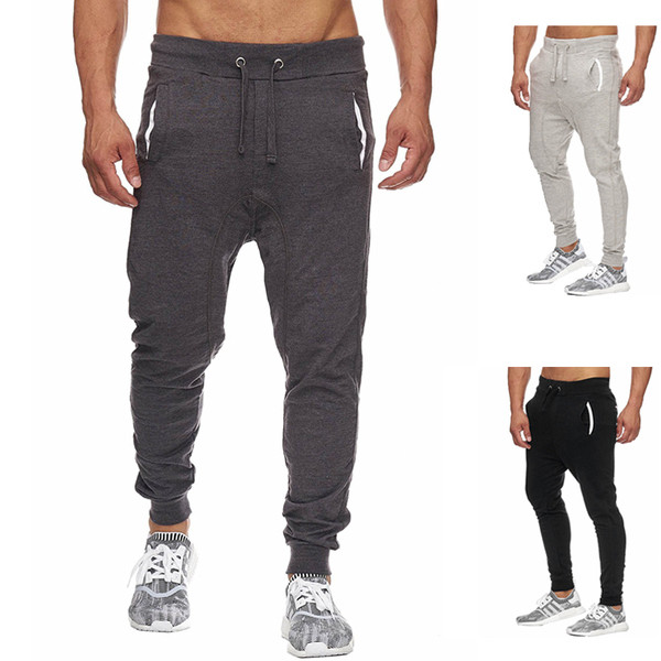 Férfi sportnadrág három színben, zsebekkel és nyakkendőkkel