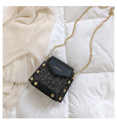 Geantă de damă modernă în trei culori cu elemente strălucitoare și un lanț metalic lung