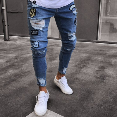 Stylish men`s jeans in three colors with torn motifs and emblems