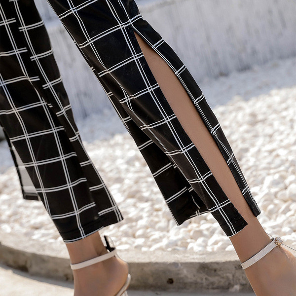 Alkalmi női nadrág magas derékkal és hasítékkal