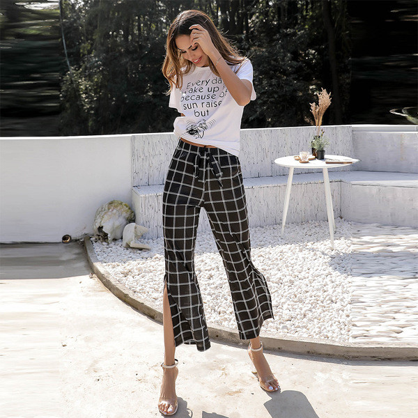 Alkalmi női nadrág magas derékkal és hasítékkal