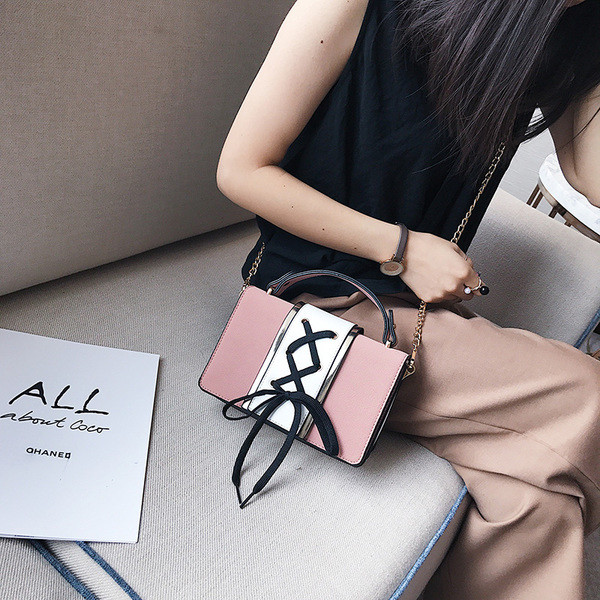 Öko velúrból készült modern női táska két színben, keresztkötéssel, rövid és hosszú füllel