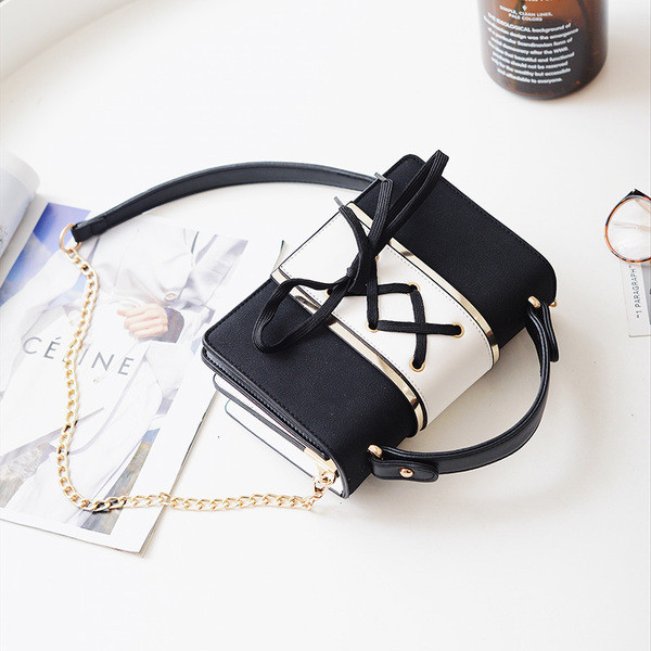 Öko velúrból készült modern női táska két színben, keresztkötéssel, rövid és hosszú füllel