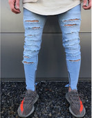 Lezser férfi farmernadrág szakadt motívumokkal, kék színű cipzárral