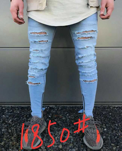 Lezser férfi farmernadrág szakadt motívumokkal, kék színű cipzárral