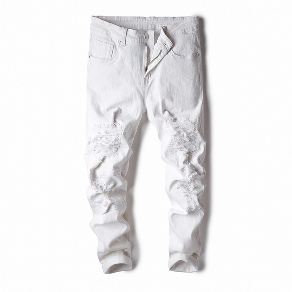 Divatos férfi nadrág fekete-fehér színben, szakadt motívumokkal